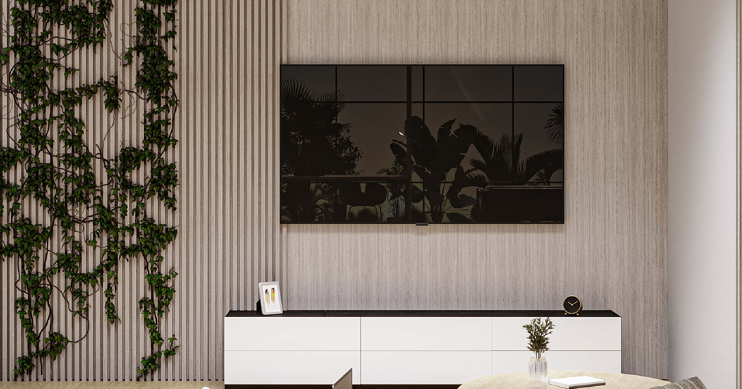Westwood By Imtiaz A modern living space featuring a wall-mounted TV, a sleek cabinet, and greenery growing on the wall.